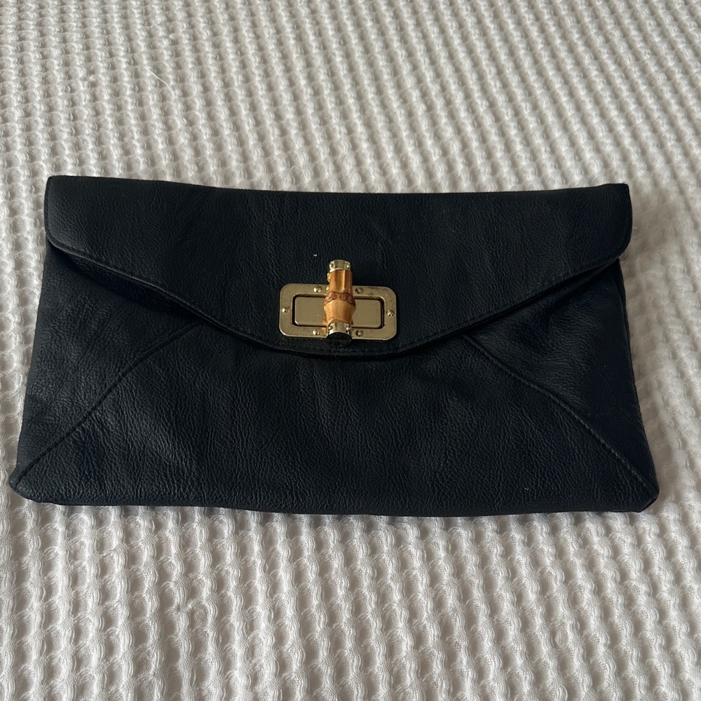 Chic Black Leather Clutch with Gold Accent